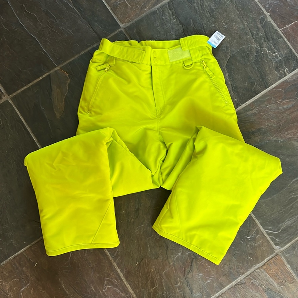 New ski pants. 14/16. Velcro adjustable waist. Zipper pockets.